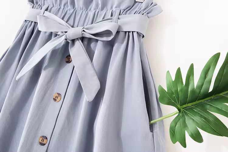Light blue high waisted midi skirt for women with button details and tied waist belt by Orchid Moda