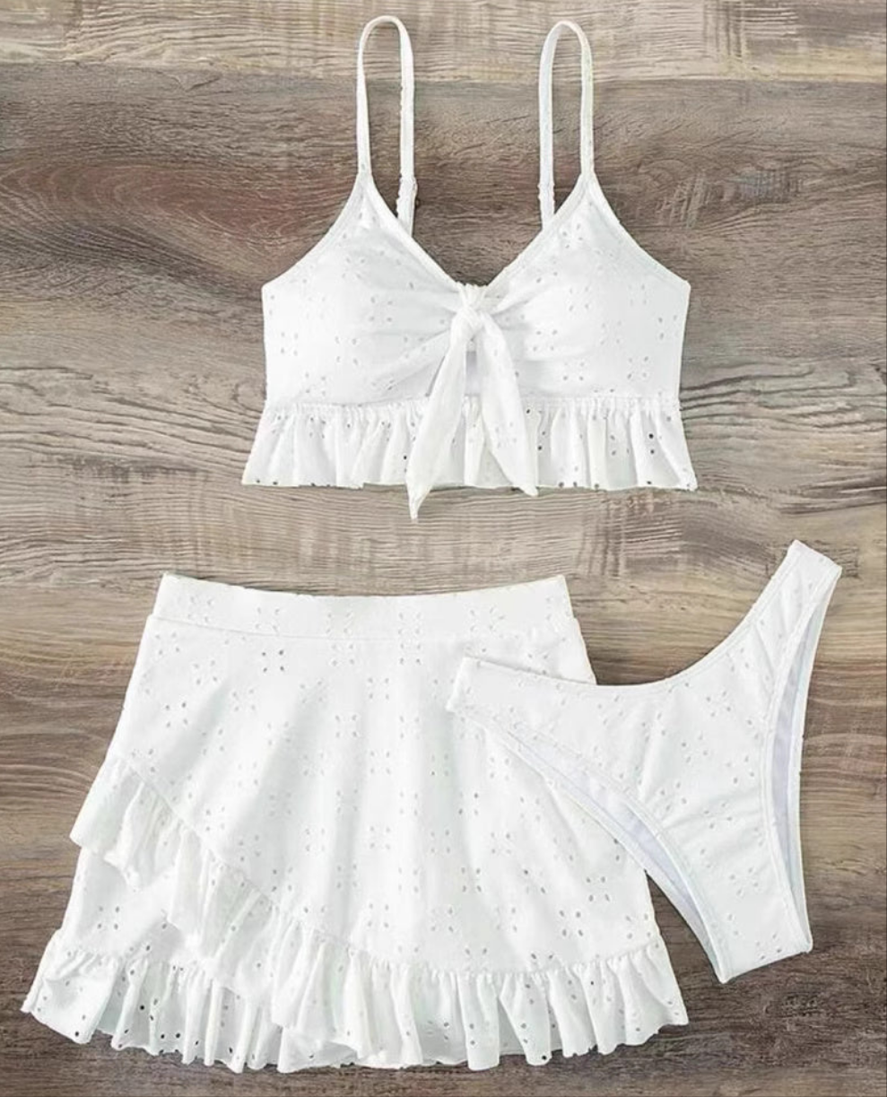 Orchid Moda white knot front swimwear set with ruffle hem skirt and matching bikini bottom