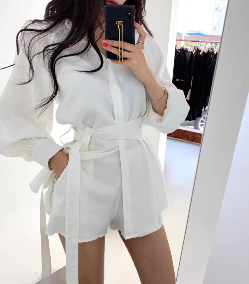 Orchid Moda white retro co-ord set with long puff sleeves and belted waist shorts outfit
