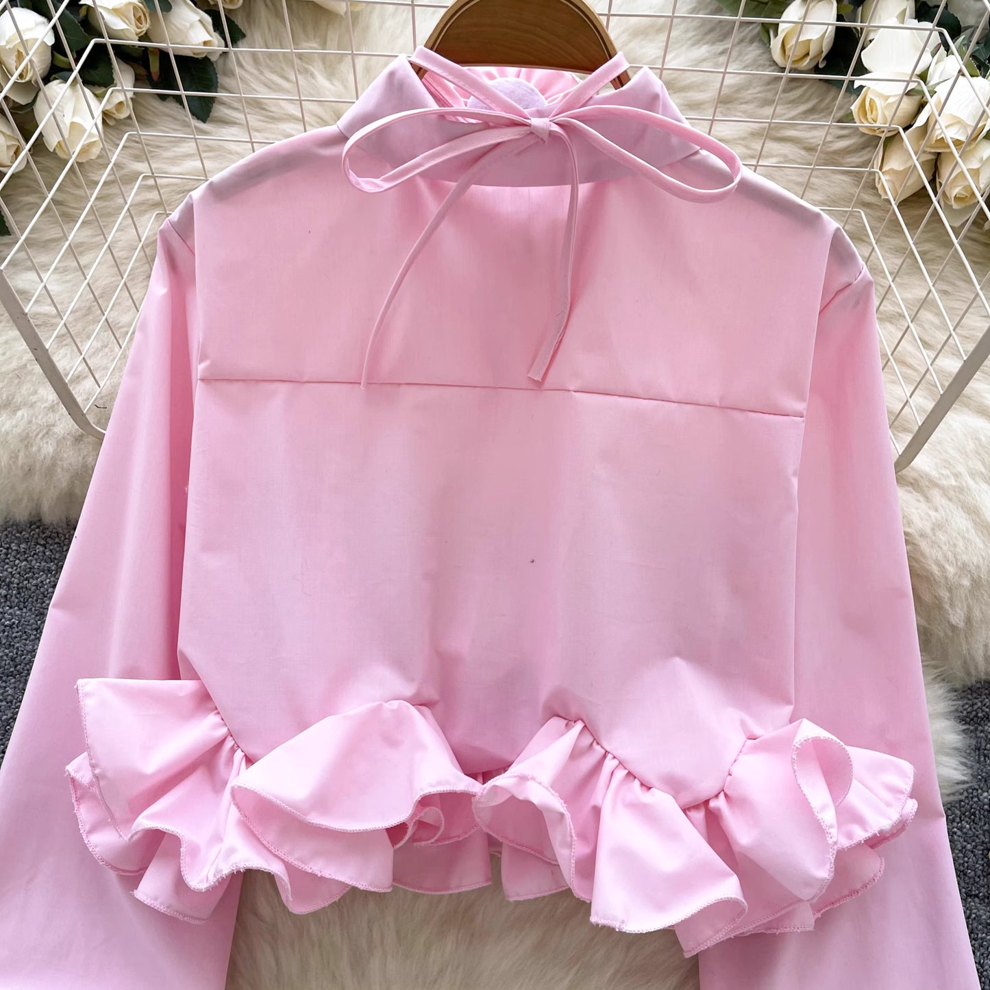 Orchid Moda ruffle rose pink shirt with long sleeves and decorative ruffles at the hem