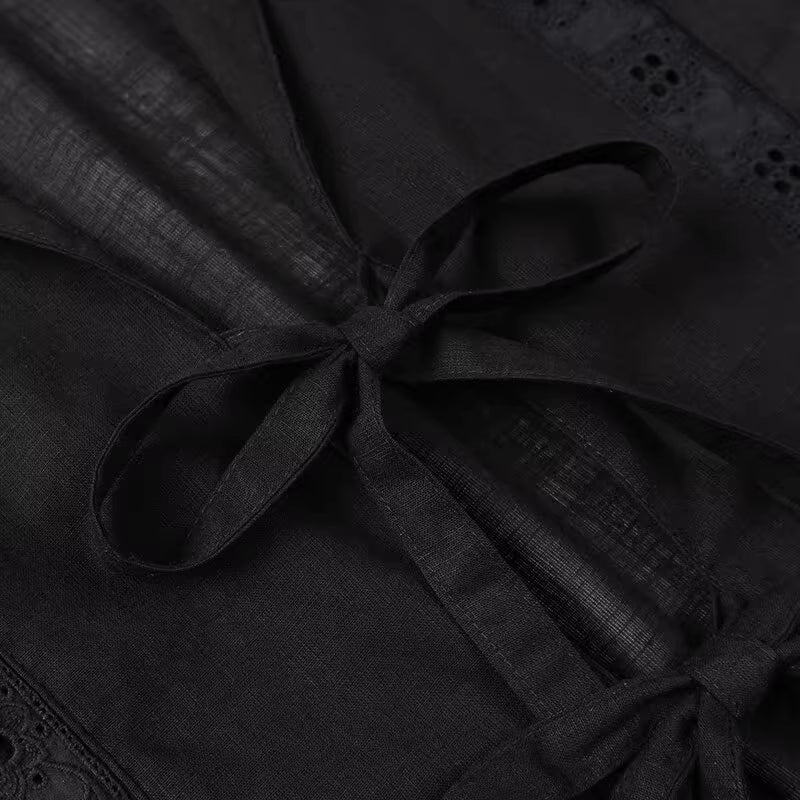 Close-up of black fabric with tied bows detailing summer co ord set for women by Orchid Moda