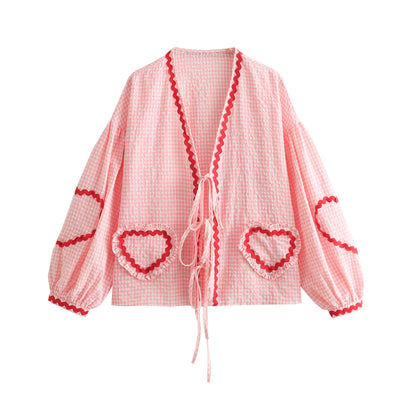 Orchid Moda gingham heart print top with red trim and front tie closure in pink and white