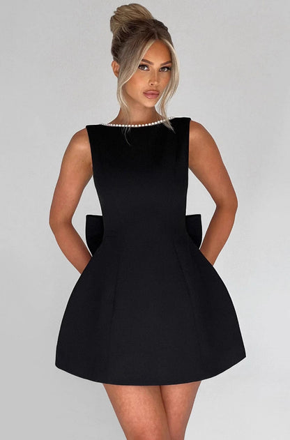 Orchid Moda Bellara cocktail party dress in black with sleeveless design and pearl neckline detail
