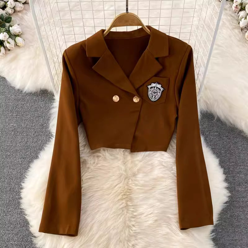 Brown cropped blazer with gold buttons and emblem detail from blazer skirt set for women by Orchid Moda