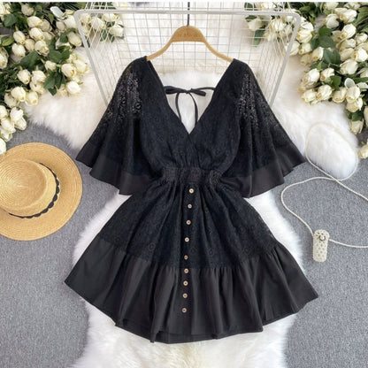 Black lace boho chic summer dress with button front and flared sleeves from Orchid Moda