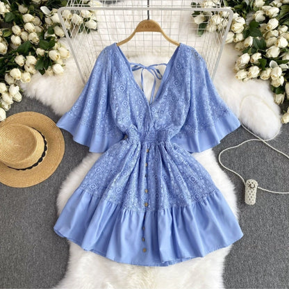 Light blue boho chic summer dress with lace details and button front from Orchid Moda