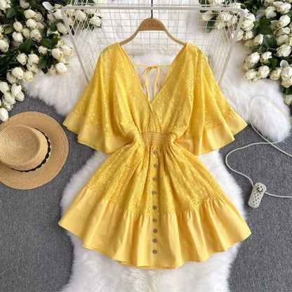 Yellow boho chic summer dress with button front and flutter sleeves by Orchid Moda