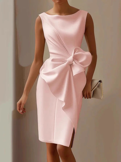 Orchid Moda elegant pink bow detail evening dress with sleeveless design and side slit