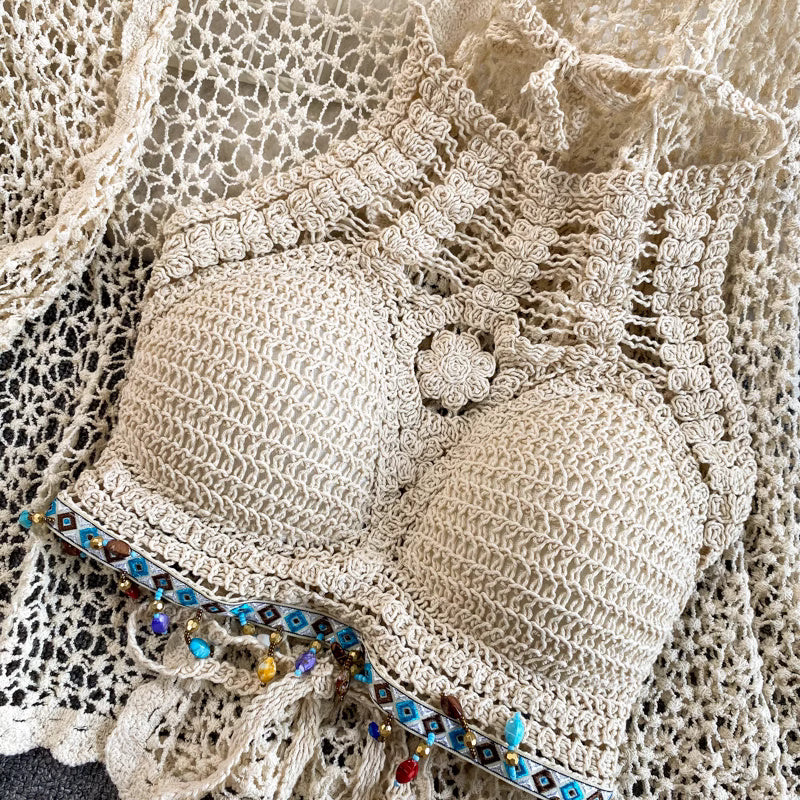 Orchid Moda crochet beachwear set featuring a beige crocheted top with decorative beads and intricate patterns