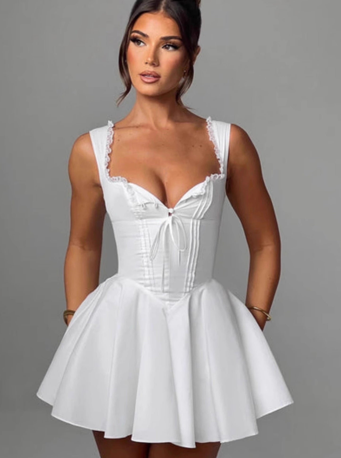 Orchid Moda white cute mini dress for parties with fitted bodice and flared skirt