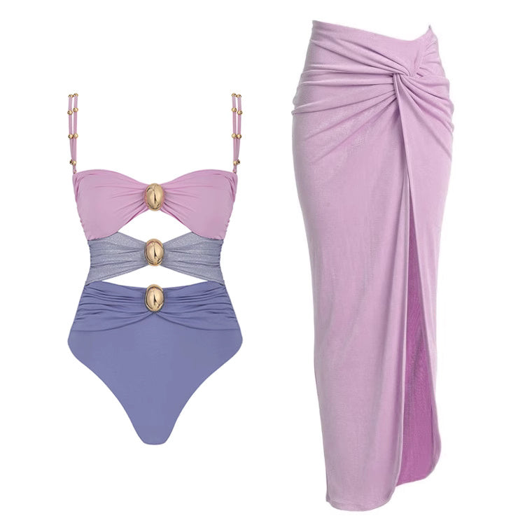 Orchid Moda fashionable summer bikinis one-piece swimsuit in purple and pink with gold accents and matching lilac sarong skirt
