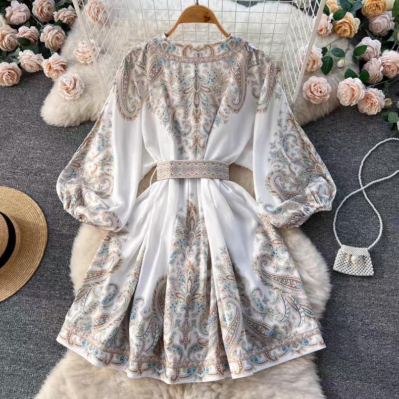 Orchid Moda floral paisley mini dress with long puff sleeves and detailed belt design