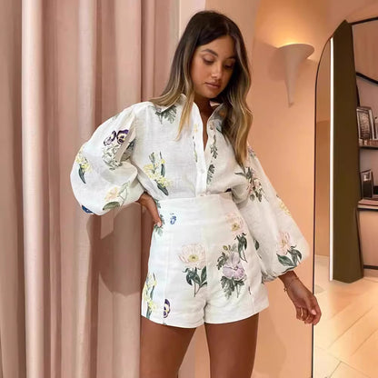 Orchid Moda floral puffed co-ord set with long puffed sleeves and matching high-waisted shorts
