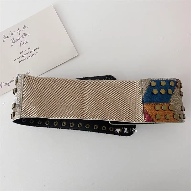 Orchid Moda gypsy buckle wide belt for women with patchwork design and studded detail