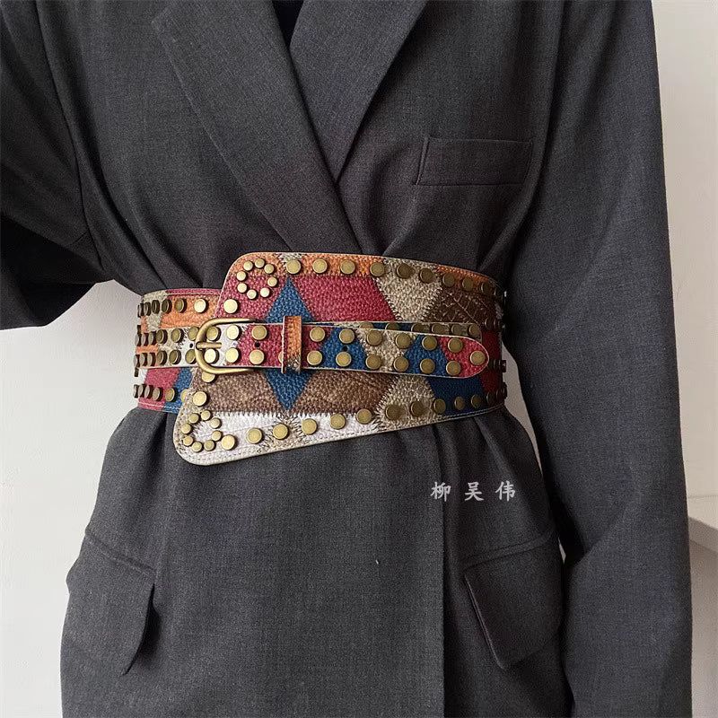 Orchid Moda gypsy buckle wide belt for women with colorful studs and unique pattern on dark jacket