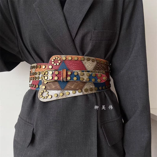 Orchid Moda gypsy buckle wide belt for women with colorful studs and unique pattern on dark jacket