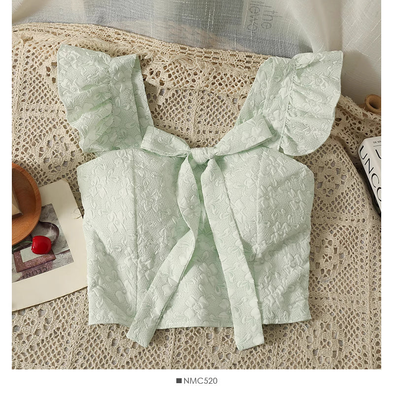 Orchid Moda light green jacquard crop top for women with ruffled sleeves and front tie detail