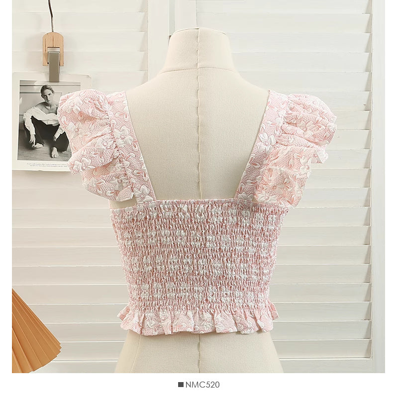 Pink floral jacquard crop top for women with ruffled puff sleeves and smocked back detailing