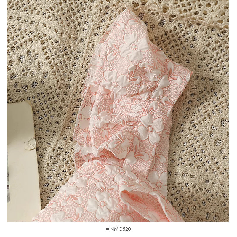 Pink floral jacquard crop top for women with textured fabric and ruffle details from Orchid Moda