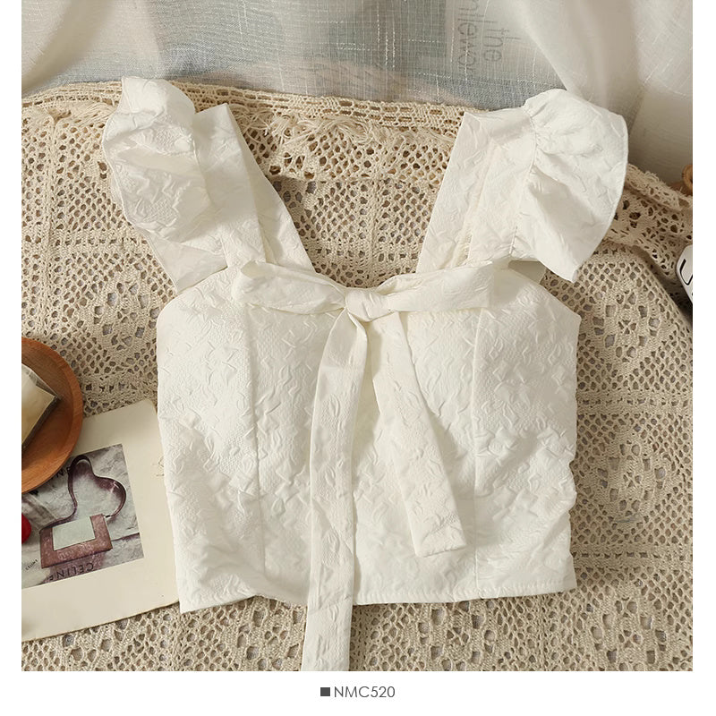 White jacquard crop top for women with ruffled straps and front tie detail from Orchid Moda