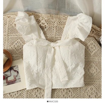 White jacquard crop top for women with ruffled straps and front tie detail from Orchid Moda
