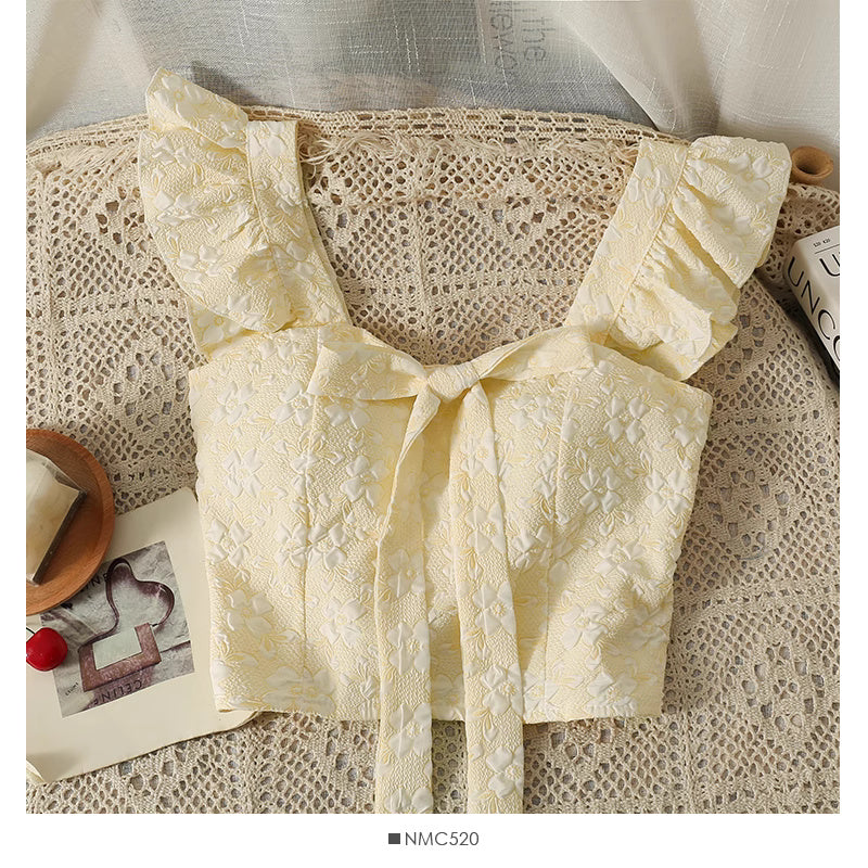 Orchid Moda cream jacquard crop top for women with ruffled straps and textured floral pattern
