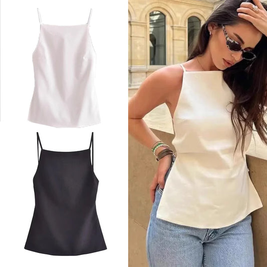 Minimalist women's tank top in white and black styles from Orchid Moda, worn with casual jeans