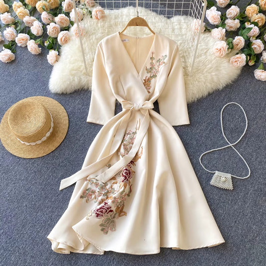 Orchid Moda almondine midi dress in cream with floral embroidery waist tie belt