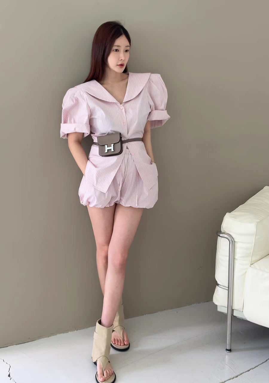 Orchid Moda puff sleeve short set in light pink worn by model with beige sandals and brown belt bag