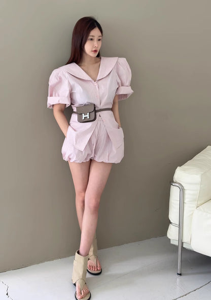 Orchid Moda puff sleeve short set in light pink worn by model with beige sandals and brown belt bag
