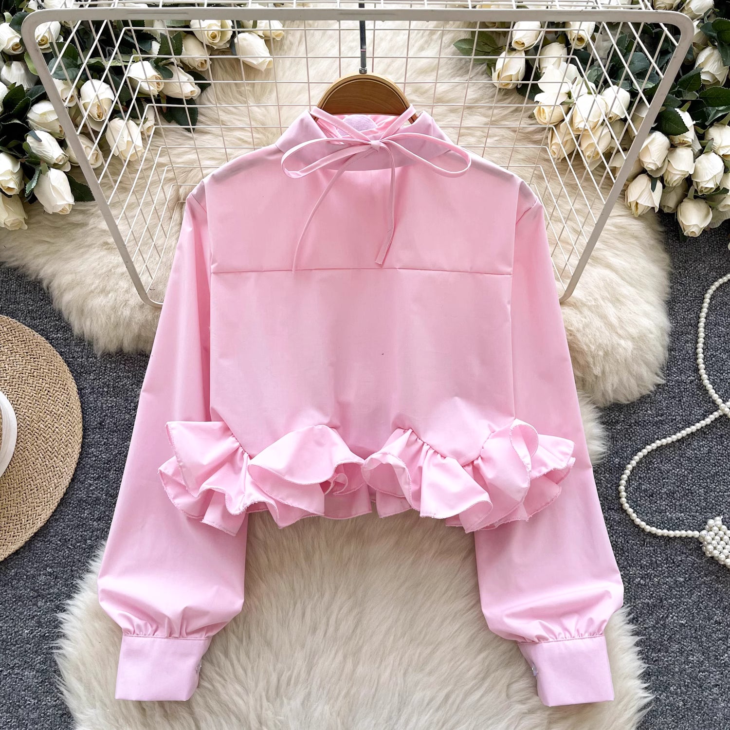 Orchid Moda ruffle rose pink shirt with long sleeves and decorative ruffle hem detail