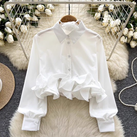 Orchid Moda white shirt with ruffle rose pink shirt detail and long puff sleeves