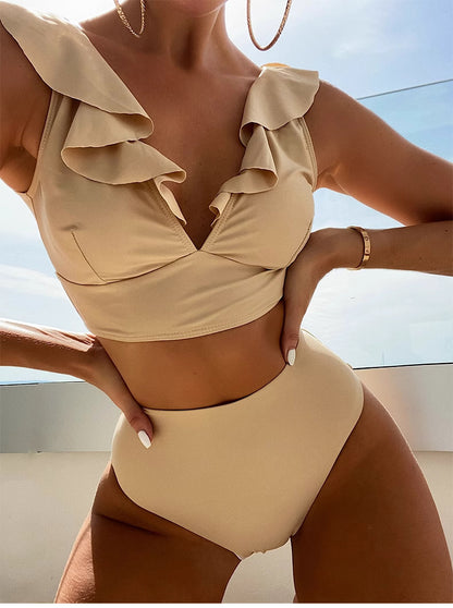 Beige ruffled neck swimsuit by Orchid Moda with high-waisted bottoms and layered ruffle detailing