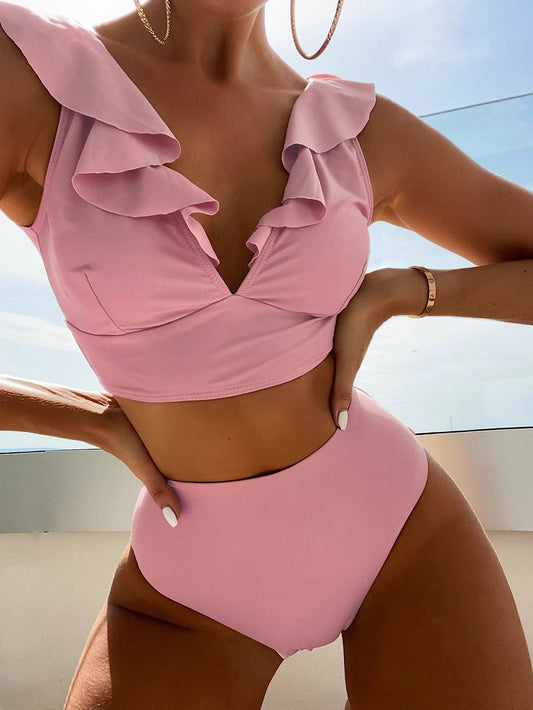 Orchid Moda pink ruffled neck swimsuit with high waist bottom and layered ruffle details