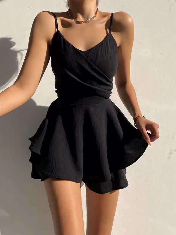Black solid culottes summer outfit featuring a sleeveless wrap top and flowy shorts