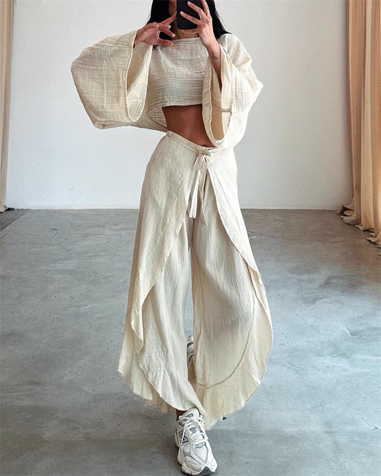 Orchid Moda cream split hem pants outfit for women paired with matching loose top and sneakers