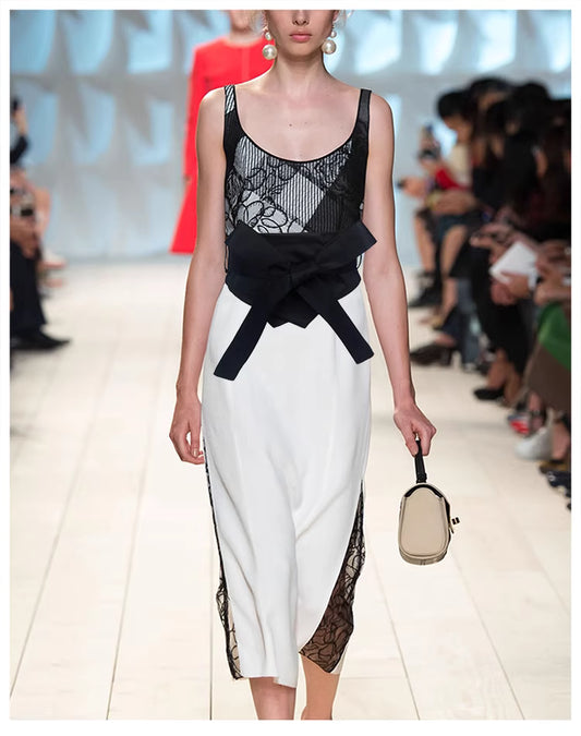 Black and white dress featuring a stylish waist band for women with lace details and sleeveless design