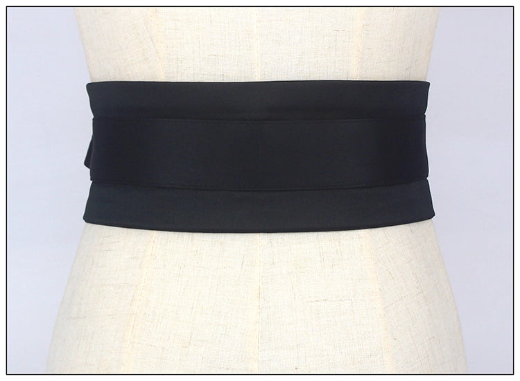 Black stylish waist band for women displayed on a mannequin by Orchid Moda