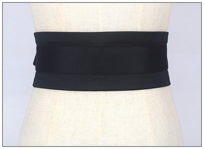 Black stylish waist band for women displayed on a mannequin by Orchid Moda