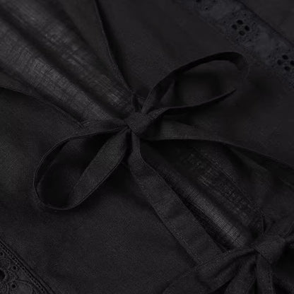 Close-up of black fabric with tied bows detailing summer co ord set for women by Orchid Moda