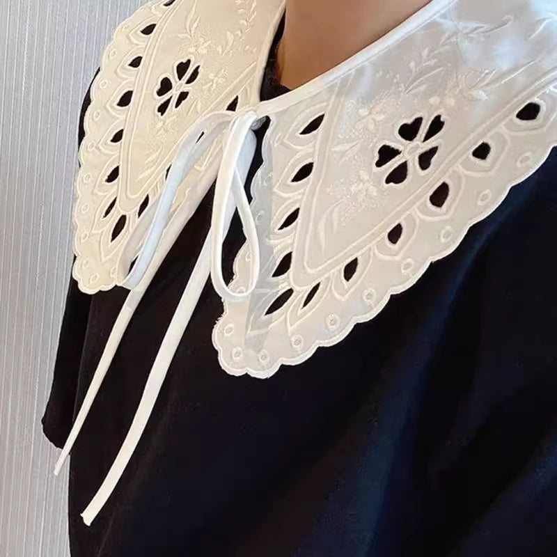 Orchid Moda trendy faux collar for women with white lace embroidery and scalloped edges tied with a bow