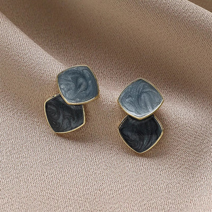 Orchid Moda trendy geometric earrings for women with black and gray marbled square design and gold edges