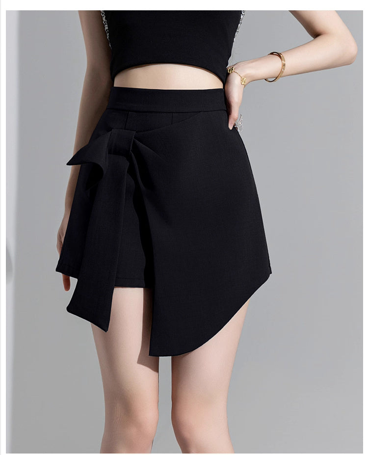 Orchid Moda trendy high waisted skort in black with asymmetrical wrap design and bow detail