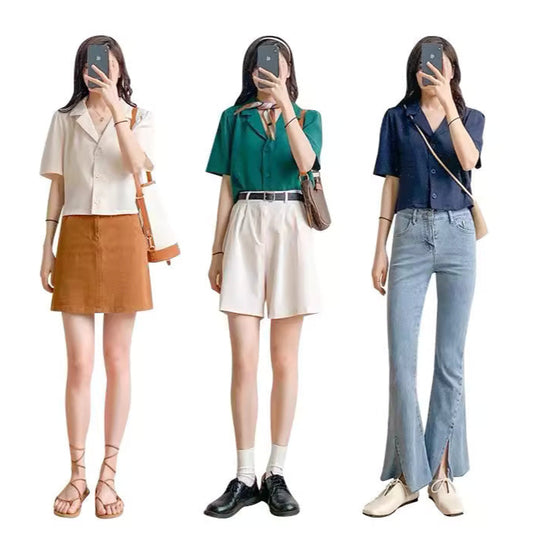 Three women modeling trendy short sleeved shirt women in cream, green, and navy with different bottoms and casual accessories