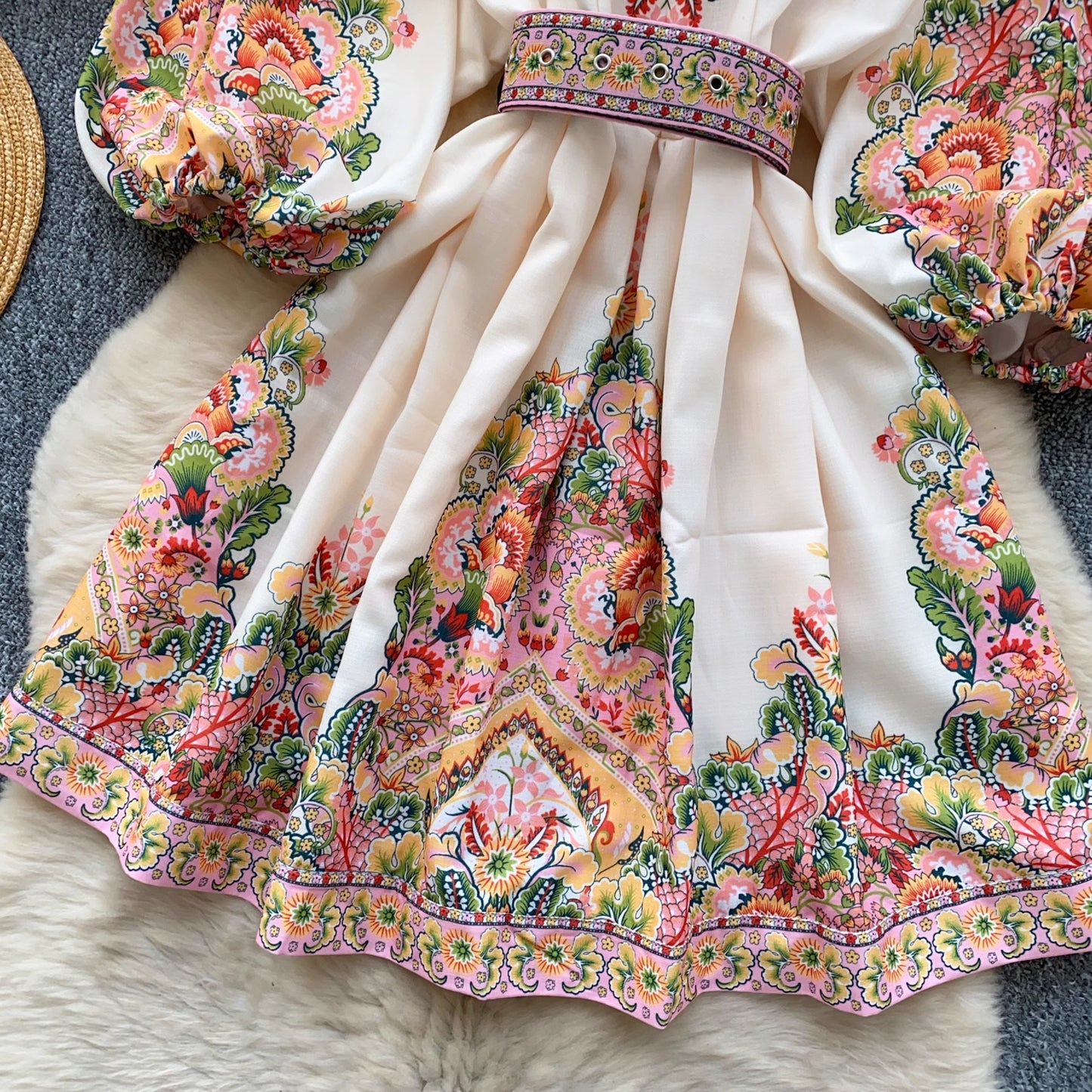 Orchid Moda trendy weekender dress for women in cream with colorful floral patterns and puffed sleeves