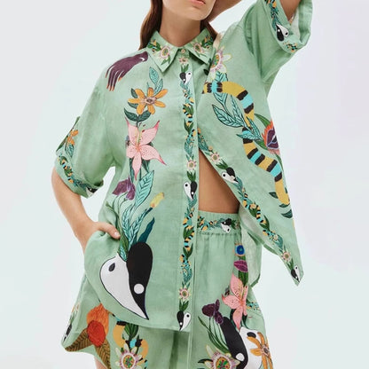 Orchid Moda tropical co-ord set for women with green floral and bird print shirt and matching shorts