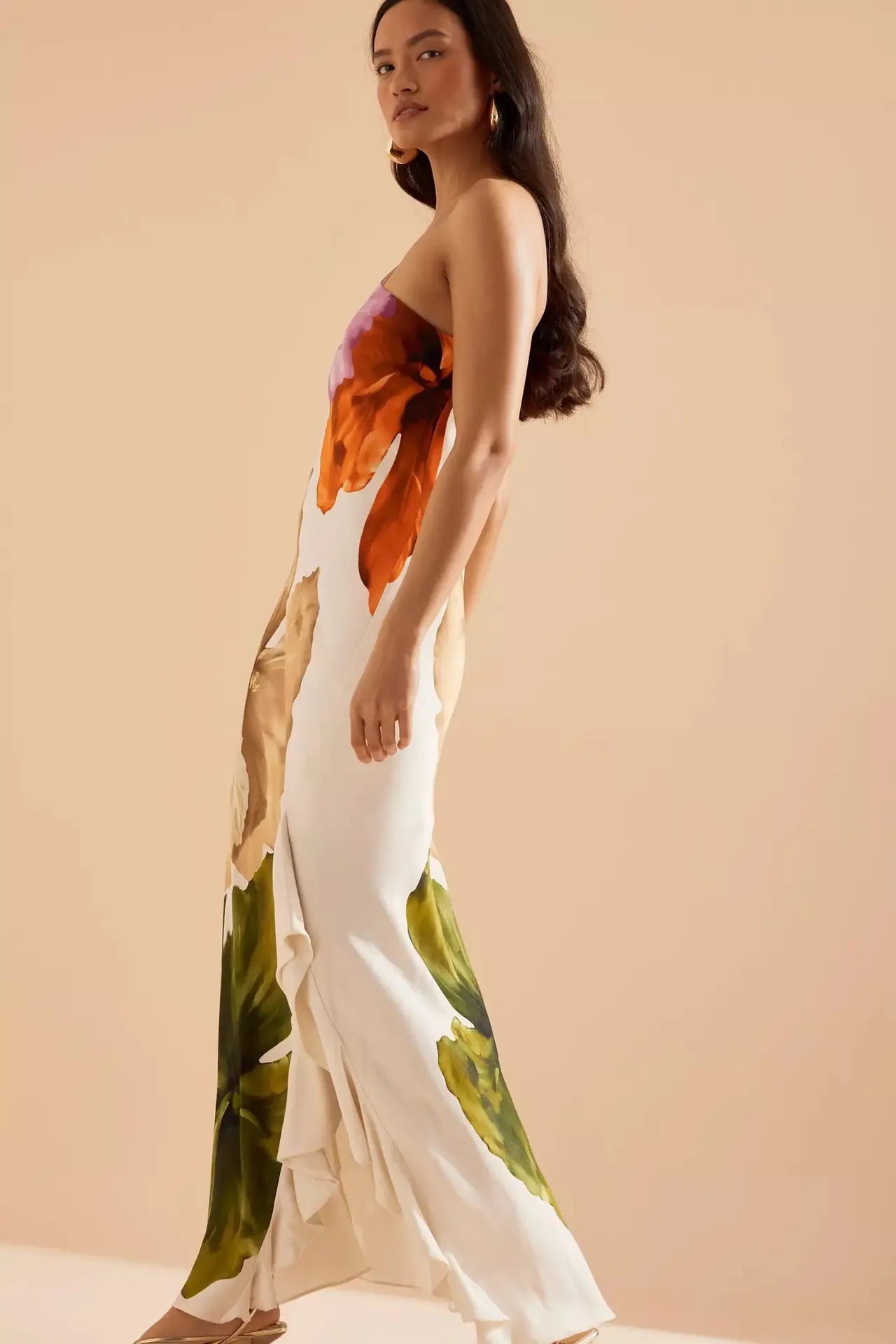 Orchid Moda unique one-shoulder dress with large floral print in vibrant colors on white fabric