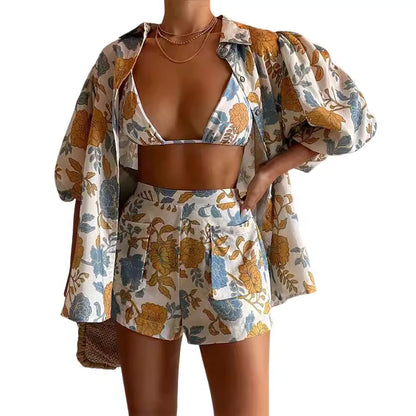 Vacation floral print co ords set with a floral bikini top, high-waisted shorts, and matching puff sleeve jacket
