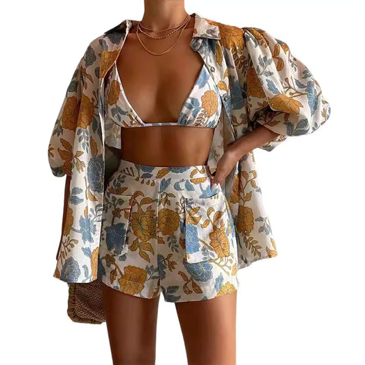Vacation floral print co ords set with a floral bikini top, high-waisted shorts, and matching puff sleeve jacket