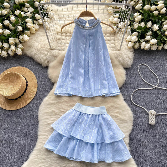 Orchid Moda light blue beaded co ord set for women with sleeveless top and tiered skirt